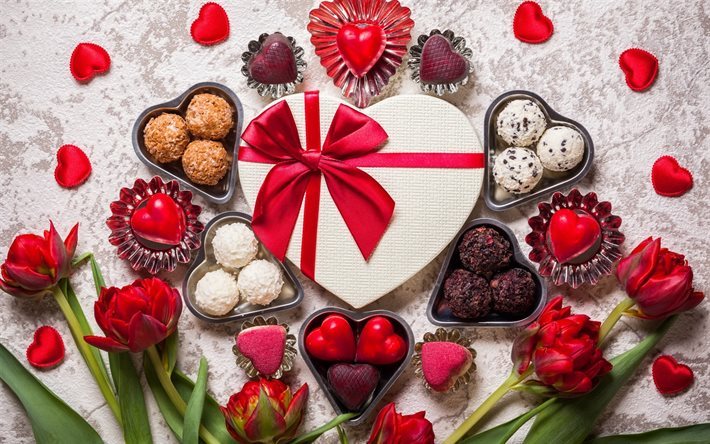 Il Giorno di san valentino, regali, cioccolatini, cuore rosso