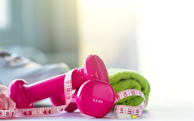 pink dumbbells, weight loss concepts, slimming, measuring tape, training