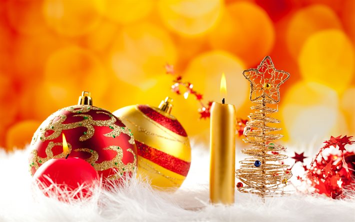 Joulupallot, hyv&#228;&#228; uutta vuotta, kultainen joulun tausta, palava kynttil&#228;, lumi, hyv&#228;&#228; joulua