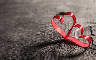 Le Jour de Valentines, deux cœurs, l&#39;amour des concepts, des rubans de soie rouge, des coeurs rouges