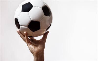 fotboll i hand, fotboll begrepp, popul&#228;r sport spel, sport utrustning, boll