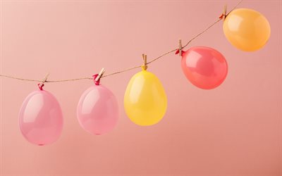 bunte luftballons, rosa hintergrund, luftballons auf einem seil, dekoration, feiertag