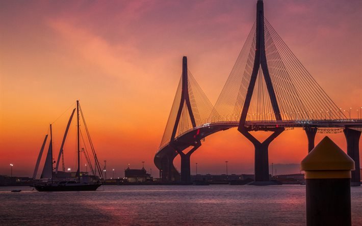 La Constitucion de 1812 Bridge, La Pepa Bridge, Cadiz, kv&#228;ll, solnedg&#229;ng, h&#228;ngbro, Cadiz Bay, Puerto Real, Spanien