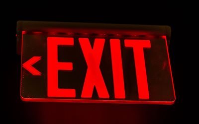 Red Exit sign, black background, exit, neon red sign, glowing Exit sign