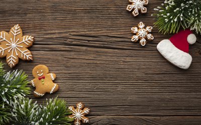 Christmas cookies, wooden background, santa hat cookies, Happy New Year, Christmas tree