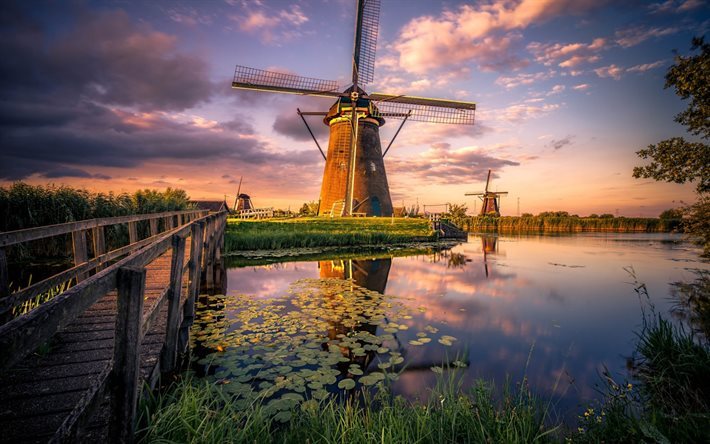 Windmills, sunset, river, field, Netherlands
