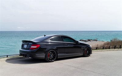 Mercedes-Benz C63 Coupe, AMG, rear view, black sports coupe, tuning c-class, black C63, German cars, black wheels, Mercedes