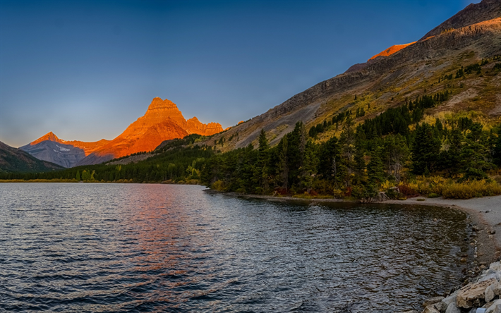 Swiftcurrent Lake, sunset, mountain lake, mountains, USA, Montana