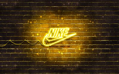 Nike sarı logo, 4k, sarı brickwall, Nike logosu, spor markaları, Nike neon logo, Nike