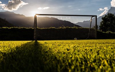 football goal, training football field, sunset, football concepts