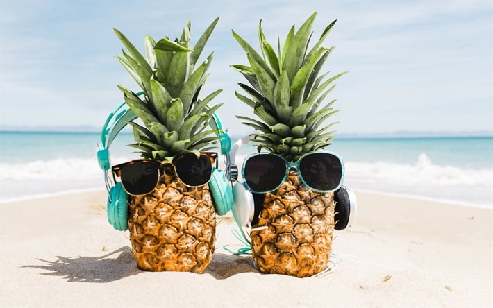 pineapples with headphones, summer tourism, beach, sand, pineapples with glasses, summer background, tropical islands, vacation