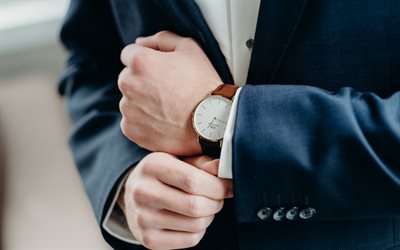 business people, business concepts, watch on hand, businessman, blue business suit