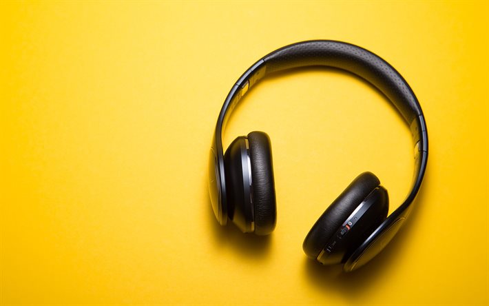 black headphones, yellow background, minimal, headphones