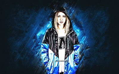 Alison Wonderland, australialainen DJ, sininen kivi tausta, muotokuva, EDM, elektroninen musiikki