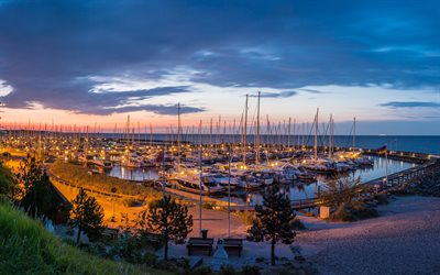 parking for yachts, white yachts, sailboats, embankment, evening, Baltic Sea, Gr&#246;mitz, Germany