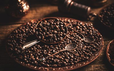 coffee grains on a plate, coffee concepts, coffee grains, old spoons, coffee