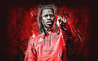 Denzel Curry, American rapper, portrait, red stone background, American singer