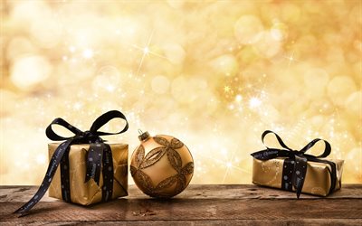 Golden Christmas background, golden gift with black silk bow, Happy New Year, Merry Christmas, Golden Christmas ball