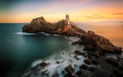 seascape, calm sea, lighthouse, sunset, evening, coast, rocks