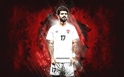 Alaa Mhawi, Iraq national football team, portrait, Iraqi footballer, red stone background, Iraq, football, Alaa Ali Mhawi