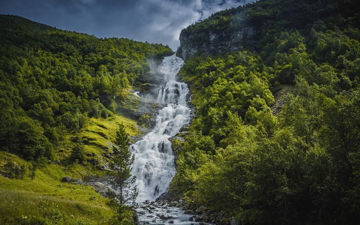 beautiful high waterfall, rock, green slope, mountains, sky, mountain waterfall