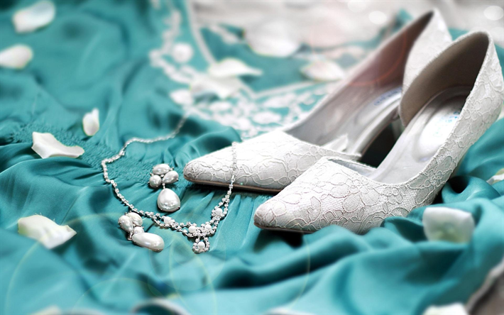 wedding concepts, white bride shoes, blue dress, jewelry, white petals