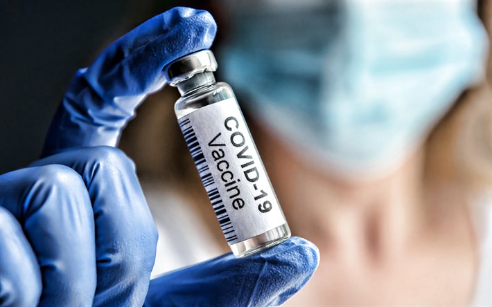Vaccino Covid-19 alla mano, vaccinazione, vaccino alla mano dell&#39;infermiere, Covid-19, vaccino, concetti di sviluppo del vaccino Covid