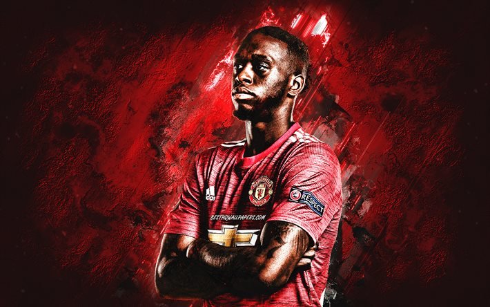 Aaron Wan Bissaka, Manchester United FC, footballeur anglais, portrait, fond de pierre rouge, football, Premier League