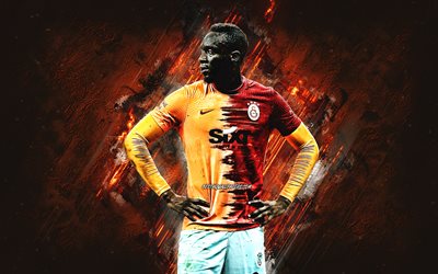 Mbaye Diagne, Galatasaray, Senegalin jalkapalloilija, muotokuva, oranssi kivitausta, jalkapallo
