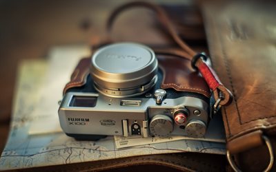 journey concepts, an old camera, a map, travel concepts, Fuji X100T