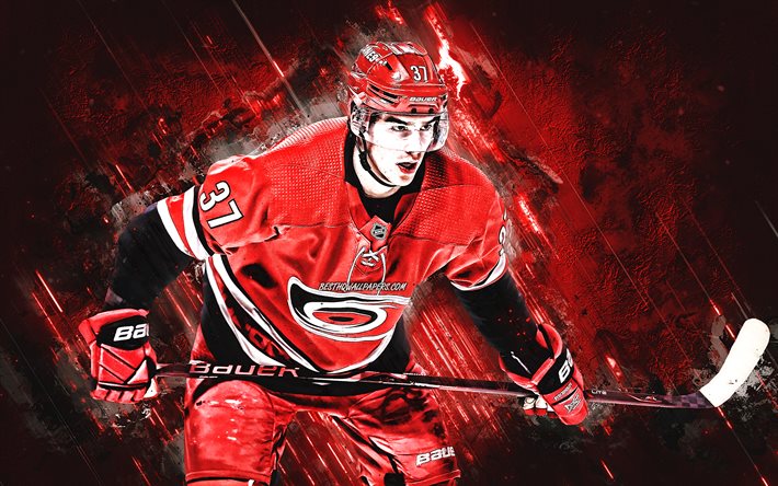 Andrei Svechnikov, Carolina Hurricanes, NHL, Russian hockey player, portrait, red stone background, USA, hockey