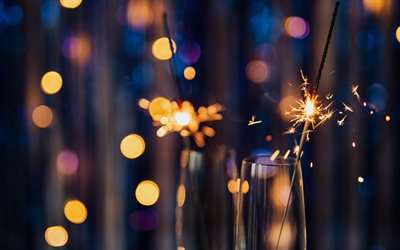 burning sparklers, evening, sparklers, glasses of champagne, new year, background blur