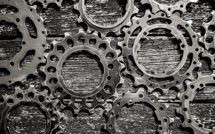 iron gears on a wooden background, mechanism concepts, gearwheels, iron gears