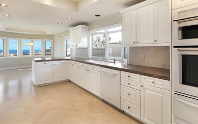 白色クラシックキッチン家具, クラシックなスタイルのキッチン, モダンなインテリアデザイン, キッチン, 茶色の大理石のcountertop