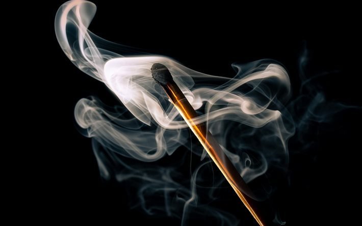 extinguished match, smoke, burnt match, smoke over a match, black background
