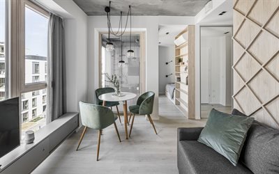 style loft dans le salon, panneaux de bois clair sur les murs, plafond en béton gris, design intérieur moderne, salon, mezzanine