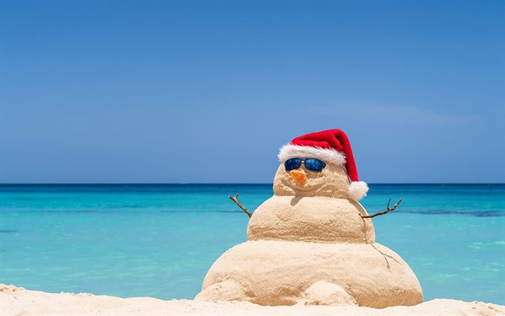 Snowman made of sand, Christmas on a tropical island, Sandy snowman, New Year, Christmas on the beach