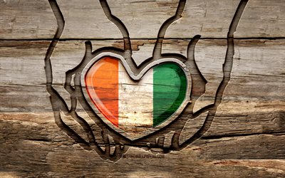 I love Cote d Ivoire, 4K, wooden carving hands, Day of Cote d Ivoire, Ivorian flag, Flag of Cote d Ivoire, Take care Cote d Ivoire, creative, Cote d Ivoire flag, Cote d Ivoire flag in hand, wood carving, african countries, Cote d Ivoire