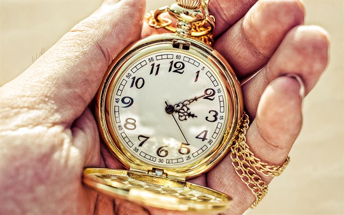oro reloj de bolsillo en las manos, los conceptos de tiempo, reloj en mano, tiempo, reloj de bolsillo