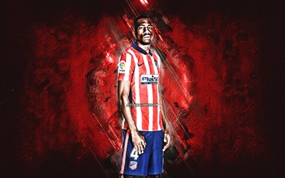 Geoffrey Kondogbia, Atletico Madrid, ranskalainen jalkapalloilija, keskikentt&#228;pelaaja, muotokuva, punainen kivitausta, jalkapallo