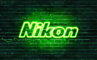 نيكون الأخضر شعار, 4k, الأخضر brickwall, نيكون شعار, العلامات التجارية, نيكون النيون شعار, نيكون