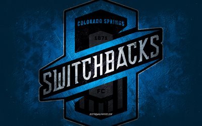 Colorado Springs Switchbacks FC, Amerikan futbol takımı, mavi arka plan, Colorado Springs Switchbacks FC logosu, grunge art, USL, futbol, Colorado Springs Switchbacks FC amblemi