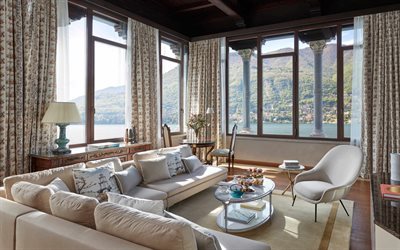 stylish living room design, classic interior style, living room, Lake Como, columns, white furniture in the living room, modern interior, idea for a classic style living room