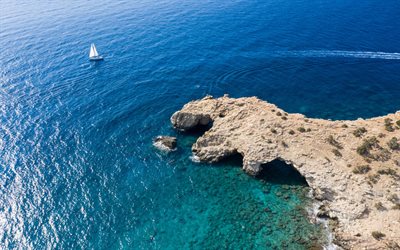 coast view from above, white yacht, sea, waves, rock, Greece, yacht at sea