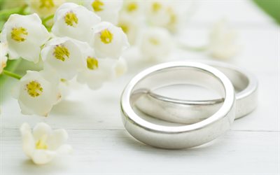 wedding rings, white spring flowers, wedding concepts, white gold rings, pair of rings