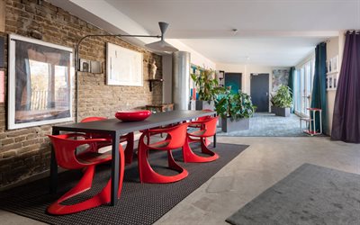 stylish interior design, dining room, red plastic chairs, red round vase, modern interior design