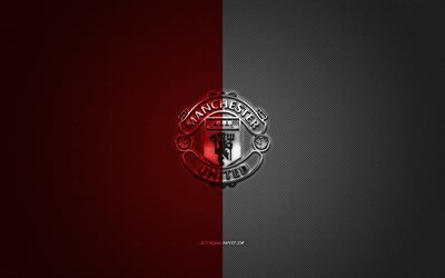 El Manchester United FC, club de f&#250;tbol ingl&#233;s, la Premier League, el rojo y el logotipo en blanco, rojo y negro de fibra de carbono de fondo, f&#250;tbol, Manchester, Inglaterra, el Manchester United logotipo