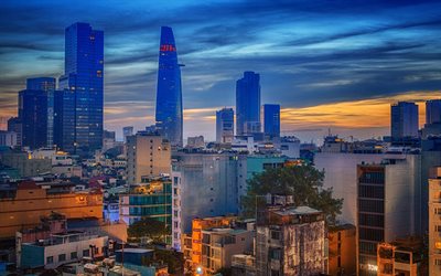 Saigon Ho Chi Minh City, Vietnam, tarde, puesta de sol, rascacielos, centros de negocios, las luces de la ciudad