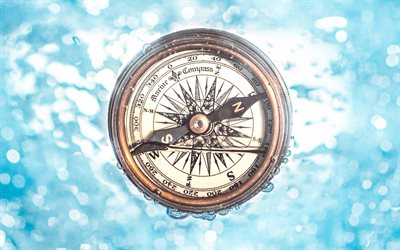 old compass, blue background, retro compass, vintage things, navigation concepts