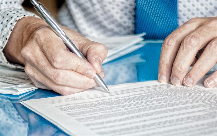 La firma del contratto, penna in mano, firma concetti, concetti aziendali, persone d&#39;affari, contratto